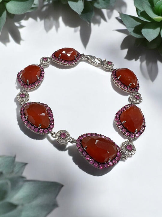 6 carnelians surrounded by hot pink sapphired and diamond bracelet