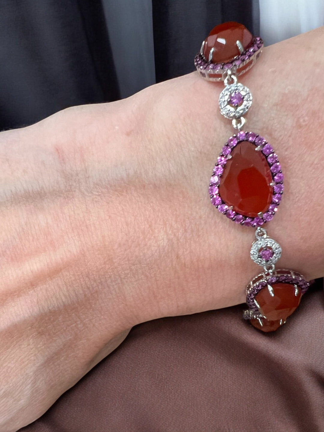 6 carnelians surrounded by hot pink sapphired and diamond bracelet