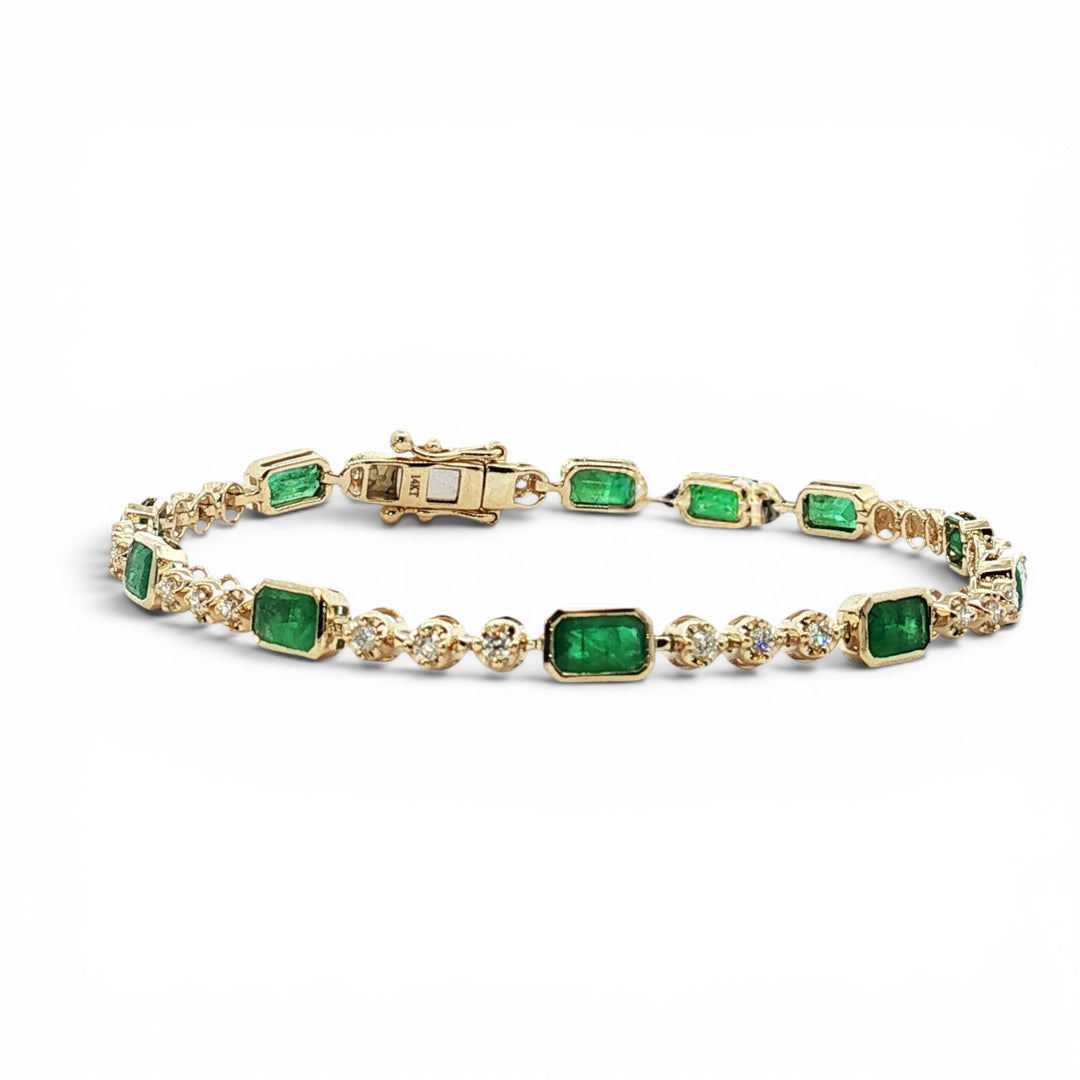 Green Emerald and diamond tennis bracelet in 14K yellow gold