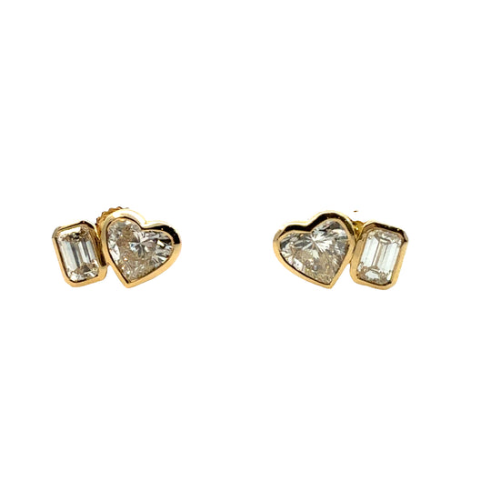 TWO DIAMOND SHAPE BEZEL STUDS